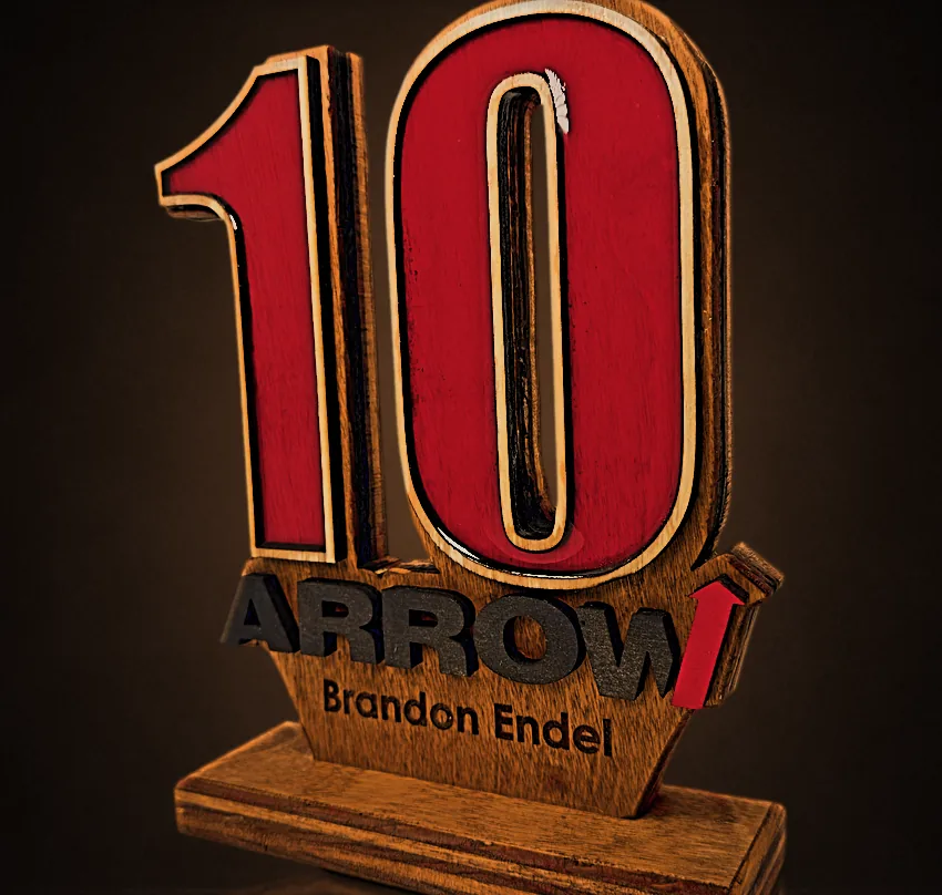Layered 10-year anniversary award with red epoxy numbers
