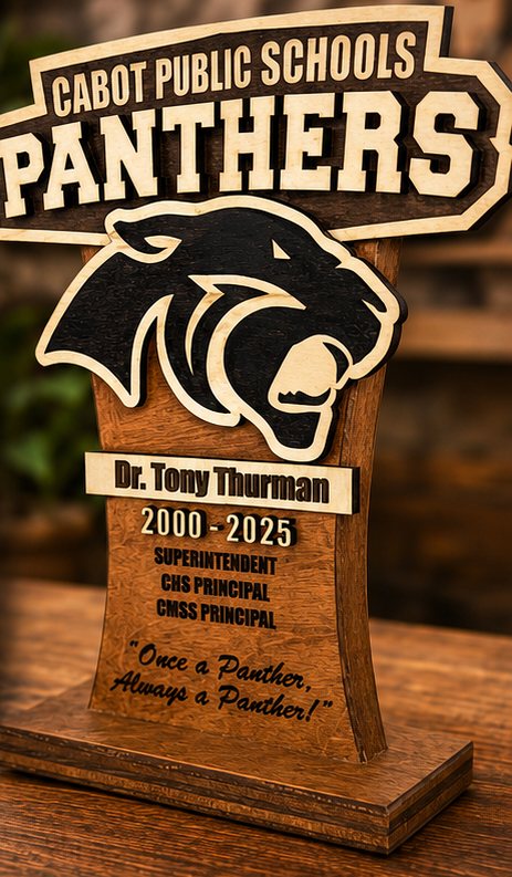 Panthers retirement award photographed on a wood table