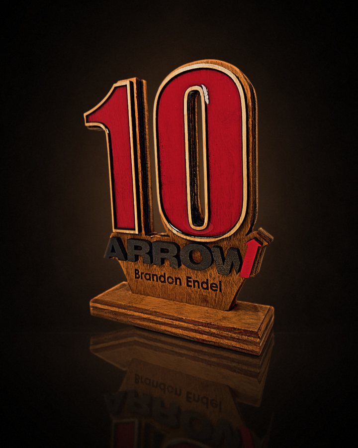 Layered 10-year anniversary award with red epoxy numbers